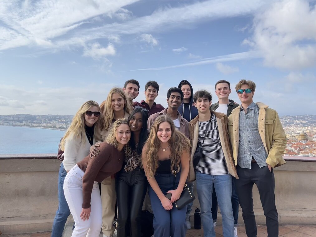 Group of students smiling at a view point